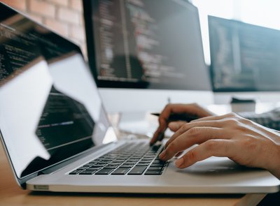 contemporary-website-developer-man-typing-and-writ-2022-10-06-05-58-31-utc_SMALL